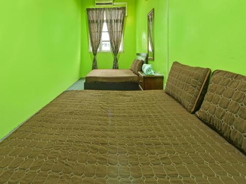 Imagen general del Hotel OYO HOME 90325 Au Homestay. Foto 5