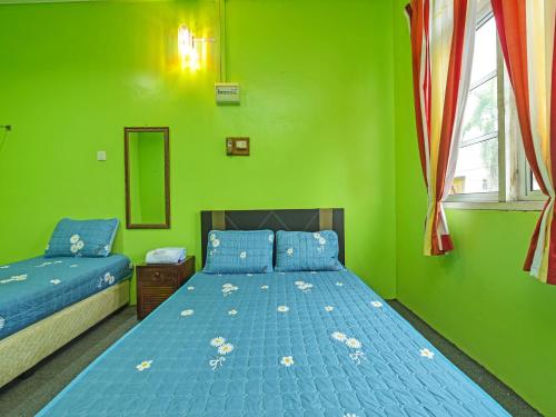 Imagen general del Hotel OYO HOME 90325 Au Homestay. Foto 8