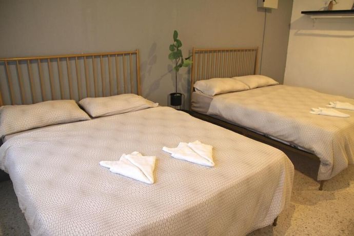 Imagen de la habitación del Hotel OYO HOME 90647 Mac Inn 94. Foto 15