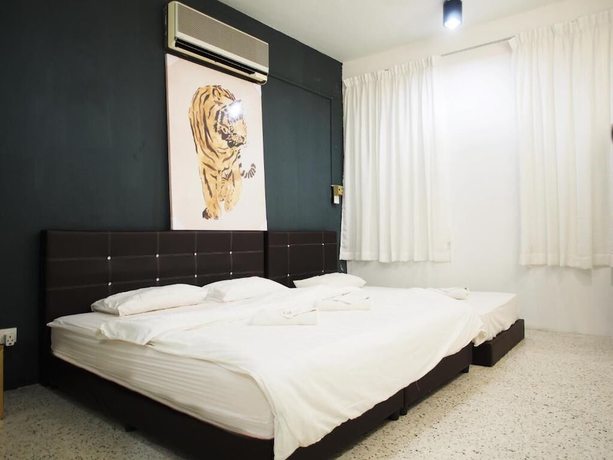 Imagen de la habitación del Hotel OYO HOME 90647 Mac Inn 94. Foto 19