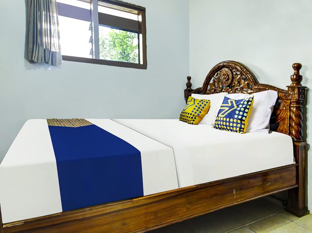 Imagen de la habitación del Hotel OYO HOMES 91242 Desa Wisata Cibuntu Kuningan Syariah. Foto 2