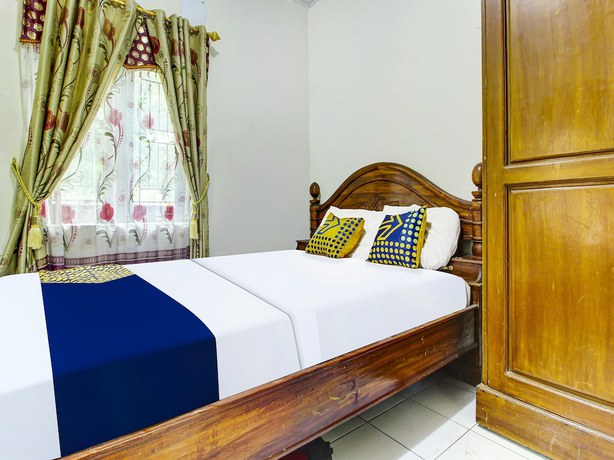 Imagen de la habitación del Hotel OYO HOMES 91242 Desa Wisata Cibuntu Kuningan Syariah. Foto 3