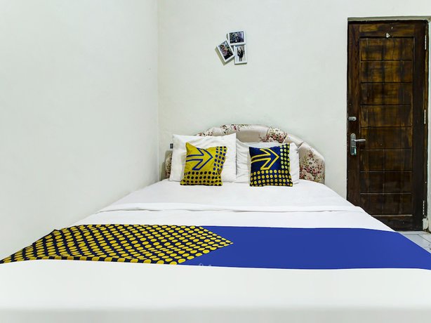 Imagen de la habitación del Hotel OYO HOMES 91242 Desa Wisata Cibuntu Kuningan Syariah. Foto 4