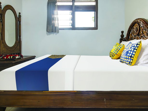 Imagen de la habitación del Hotel OYO HOMES 91242 Desa Wisata Cibuntu Kuningan Syariah. Foto 5