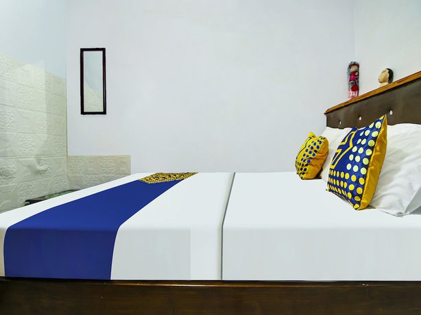 Imagen de la habitación del Hotel OYO HOMES 91242 Desa Wisata Cibuntu Kuningan Syariah. Foto 7