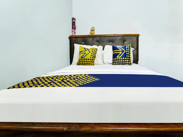 Imagen de la habitación del Hotel OYO HOMES 91242 Desa Wisata Cibuntu Kuningan Syariah. Foto 8