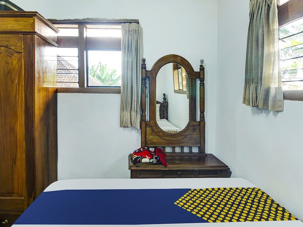 Imagen de la habitación del Hotel OYO HOMES 91242 Desa Wisata Cibuntu Kuningan Syariah. Foto 9