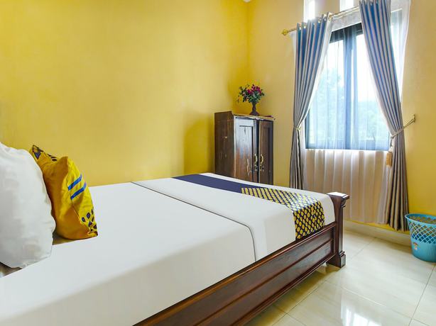 Imagen de la habitación del Hotel OYO HOMES 91242 Desa Wisata Cibuntu Kuningan Syariah. Foto 10