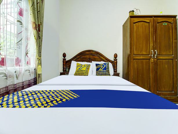 Imagen de la habitación del Hotel OYO HOMES 91242 Desa Wisata Cibuntu Kuningan Syariah. Foto 11