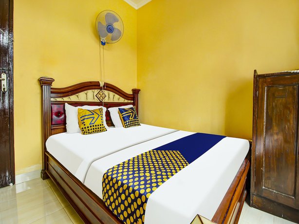 Imagen de la habitación del Hotel OYO HOMES 91242 Desa Wisata Cibuntu Kuningan Syariah. Foto 12