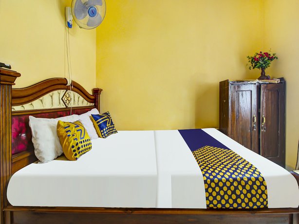 Imagen de la habitación del Hotel OYO HOMES 91242 Desa Wisata Cibuntu Kuningan Syariah. Foto 13