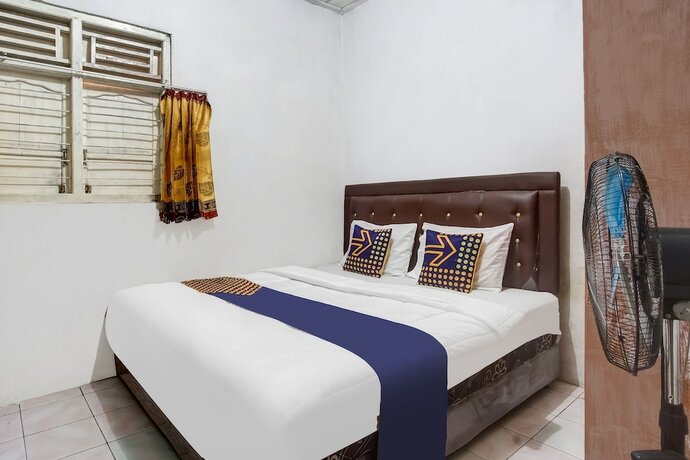Imagen de la habitación del Hotel OYO HOMES 91255 Desa Wisata Embung Purworejo Syariah. Foto 19