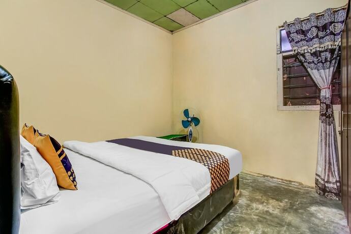 Imagen de la habitación del Hotel OYO HOMES 91255 Desa Wisata Embung Purworejo Syariah. Foto 20