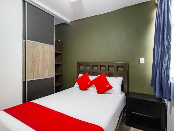 Imagen de la habitación del Hotel OYO Halley. Foto 3