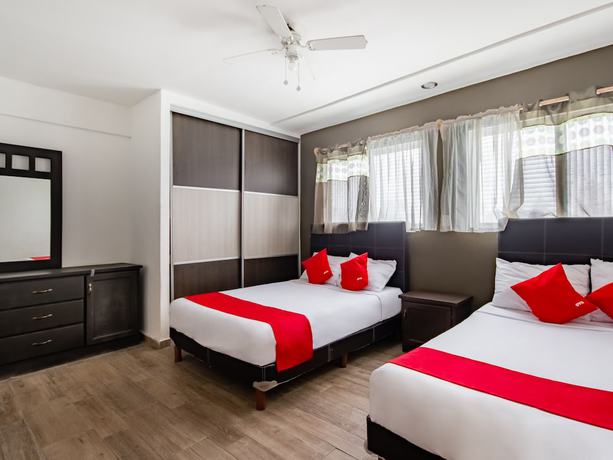Imagen de la habitación del Hotel OYO Halley. Foto 4