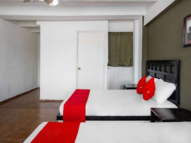 Imagen de la habitación del Hotel OYO Halley. Foto 7