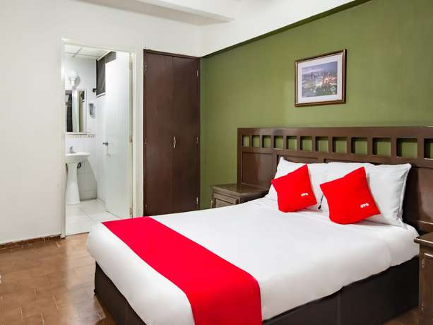 Imagen de la habitación del Hotel OYO Halley. Foto 10