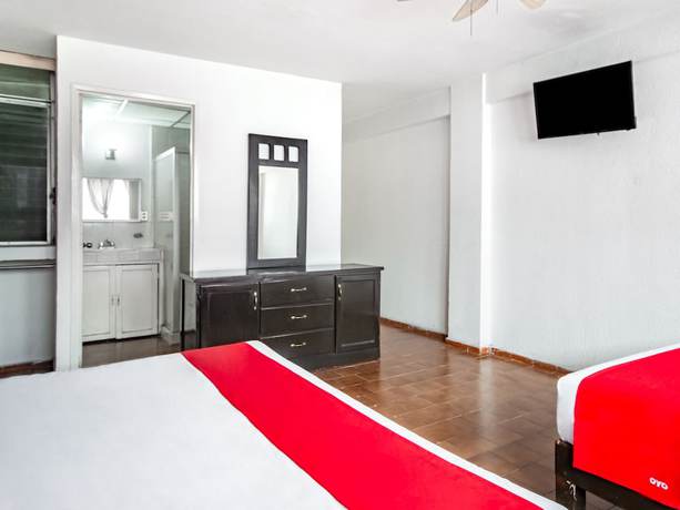Imagen de la habitación del Hotel OYO Halley. Foto 11