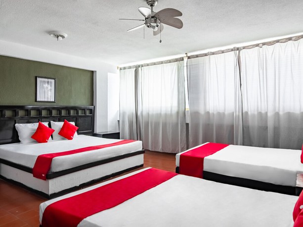 Imagen de la habitación del Hotel OYO Halley. Foto 12