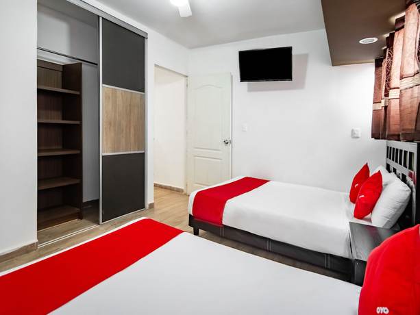 Imagen de la habitación del Hotel OYO Halley. Foto 16