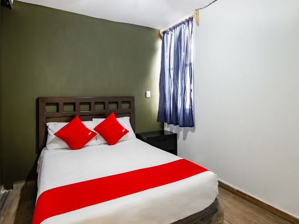 Imagen de la habitación del Hotel OYO Halley. Foto 17