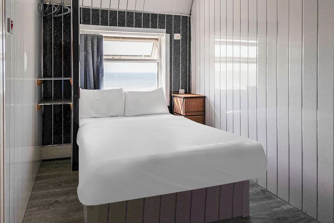 Imagen de la habitación del Hotel OYO Harlands. Foto 3