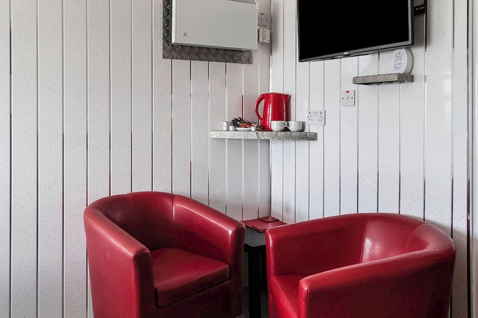 Imagen de los interiores del Hotel OYO Harlands. Foto 13