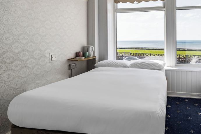 Imagen de la habitación del Hotel OYO Harlands. Foto 5
