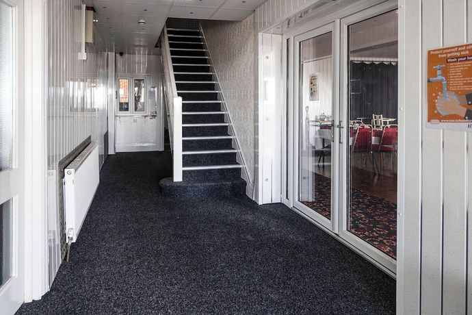 Imagen de los interiores del Hotel OYO Harlands. Foto 14