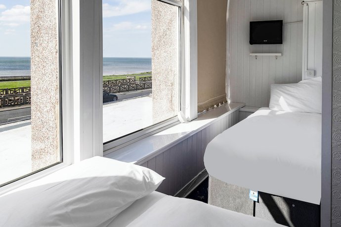 Imagen de la habitación del Hotel OYO Harlands. Foto 6