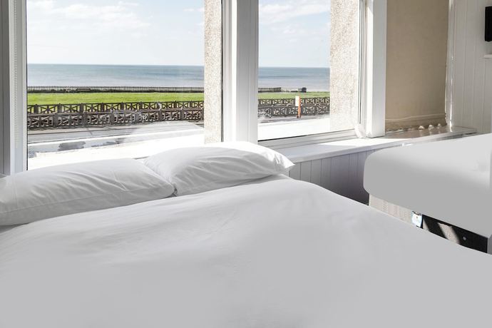 Imagen de la habitación del Hotel OYO Harlands. Foto 7