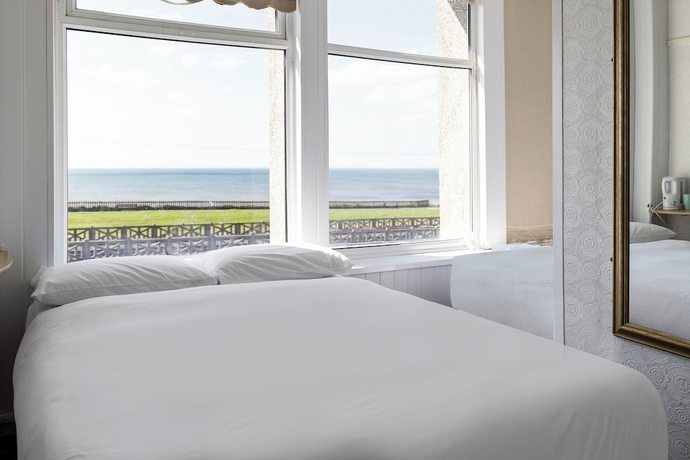Imagen de la habitación del Hotel OYO Harlands. Foto 9