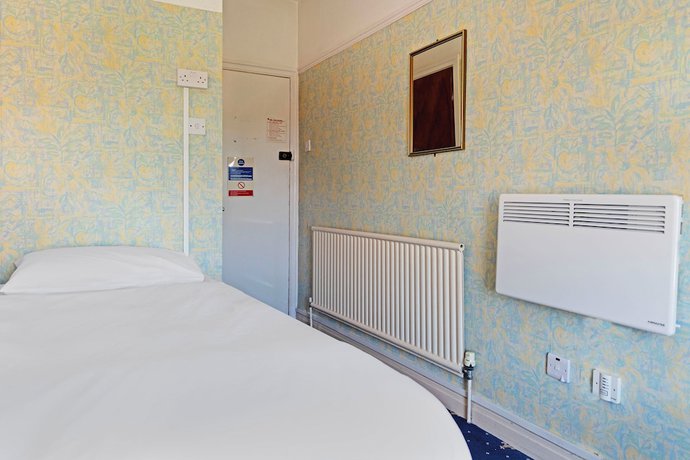 Imagen de la habitación del Hotel OYO Harlands. Foto 11