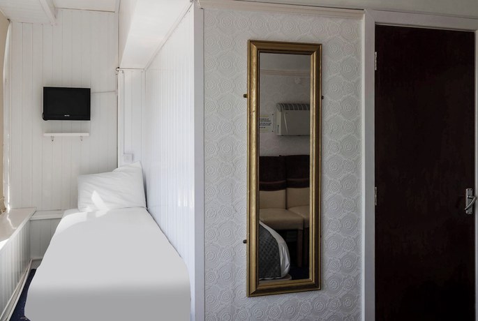 Imagen de la habitación del Hotel OYO Harlands. Foto 12