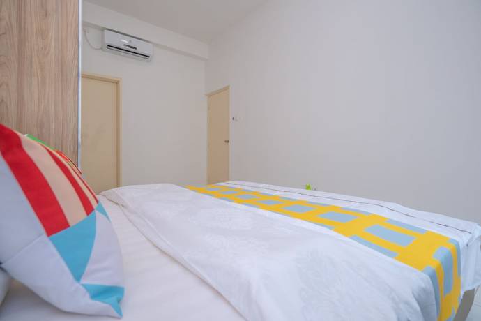 Imagen de la habitación del Hotel OYO Home 89458 Amazing 2br D\'summit. Foto 10