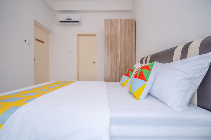 Imagen de la habitación del Hotel OYO Home 89458 Amazing 2br D\'summit. Foto 15