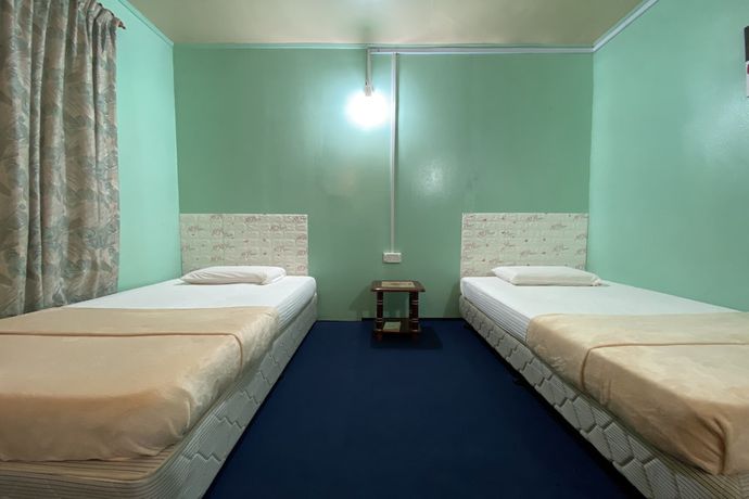 Imagen de la habitación del Hotel OYO Home 90285 Pogimpaan Homestay. Foto 8