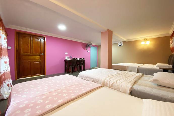 Imagen de la habitación del Hotel OYO Home 90285 Pogimpaan Homestay. Foto 11