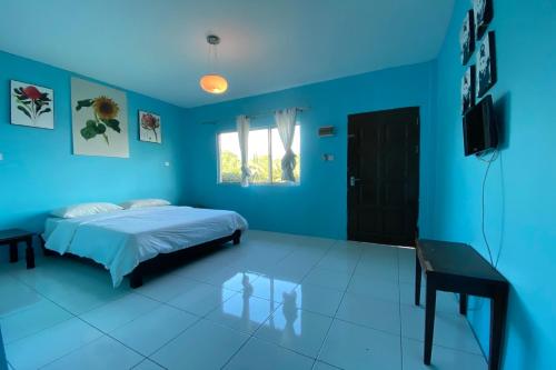 Imagen de la habitación del Hotel OYO Home 90287 Rb Homestay & Farms. Foto 17