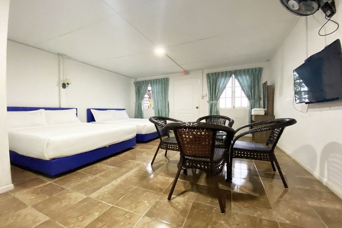 Imagen de la habitación del Hotel OYO Home 90329 Bridge House Homestay. Foto 10