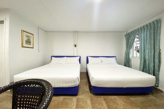 Imagen de la habitación del Hotel OYO Home 90329 Bridge House Homestay. Foto 17