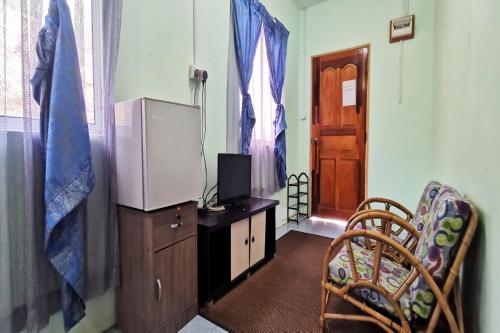 Imagen general del Hotel OYO Home 90339 Sosodikon Inap Desa. Foto 16