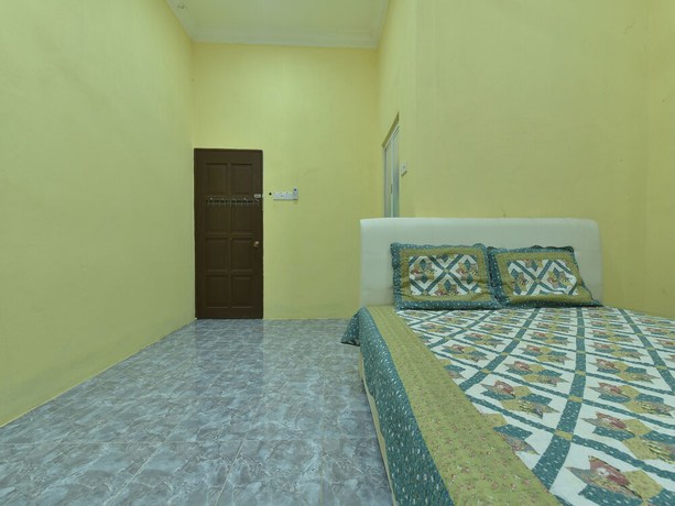 Imagen de la habitación del Hotel OYO Home 90607 Casaria Besut. Foto 4