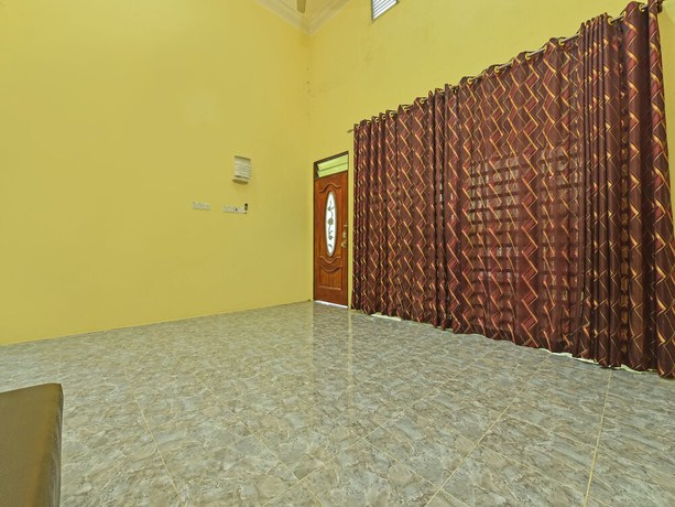 Imagen de los interiores del Hotel OYO Home 90607 Casaria Besut. Foto 18