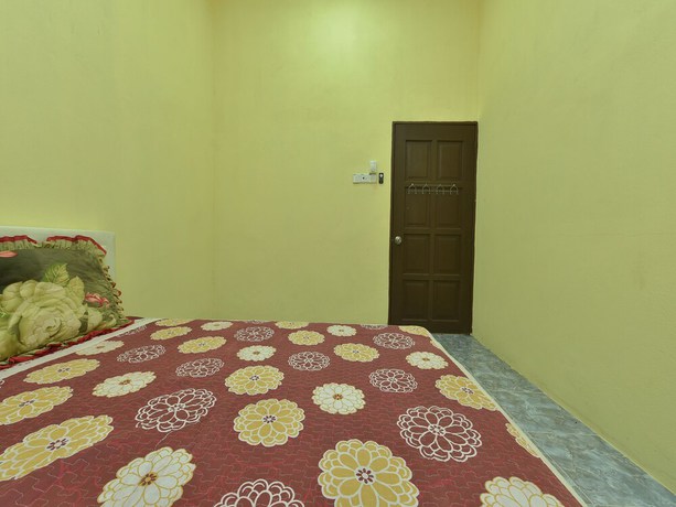 Imagen de la habitación del Hotel OYO Home 90607 Casaria Besut. Foto 7