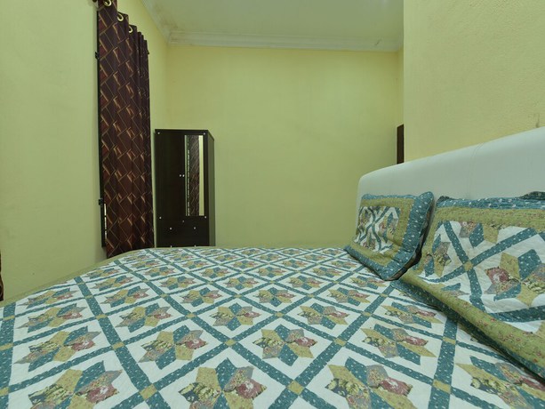 Imagen de la habitación del Hotel OYO Home 90607 Casaria Besut. Foto 8