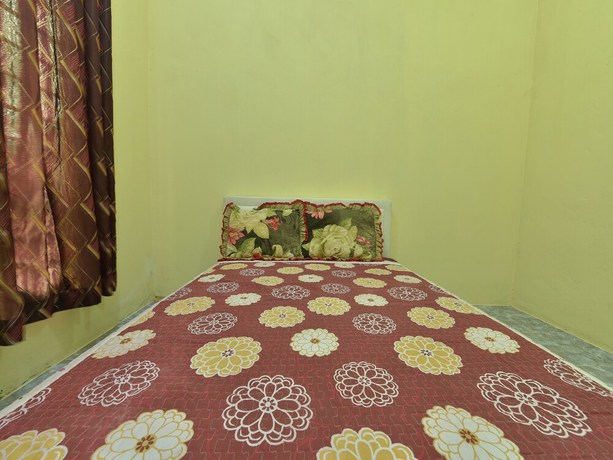 Imagen de la habitación del Hotel OYO Home 90607 Casaria Besut. Foto 10