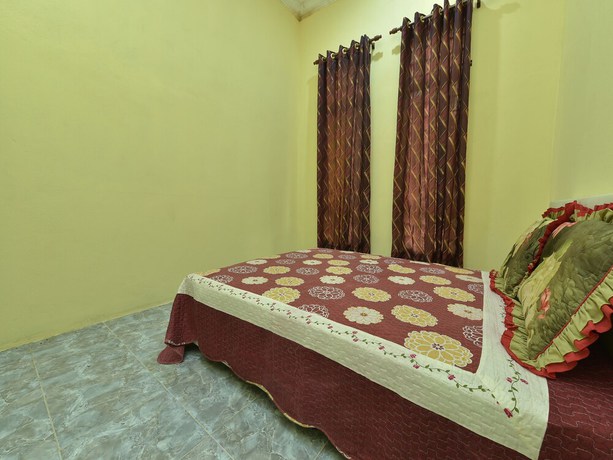 Imagen de la habitación del Hotel OYO Home 90607 Casaria Besut. Foto 13