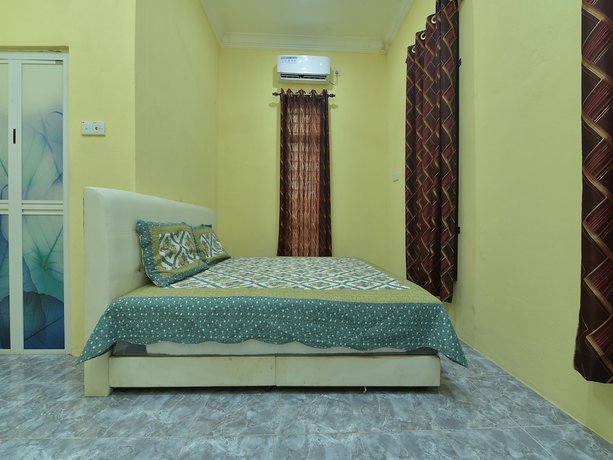 Imagen de la habitación del Hotel OYO Home 90607 Casaria Besut. Foto 14
