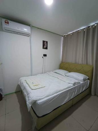 Imagen general del Hotel OYO Home 90723 Green Leaf Guest Lodge Kk. Foto 5